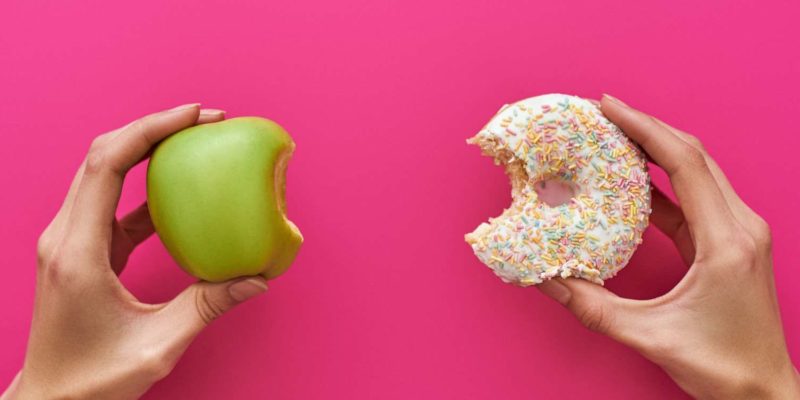 image of apple and donut for branding article dunkin donuts rebrand