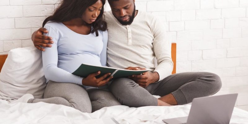 image of black african american couple budgeting banking