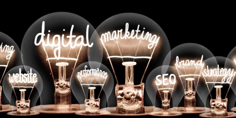 image of light bulbs with words behind branding marketing